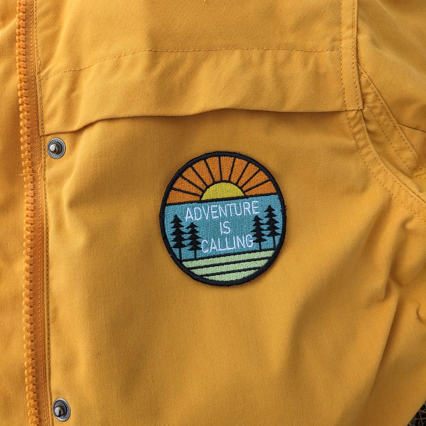 Adventure kangasmerkki