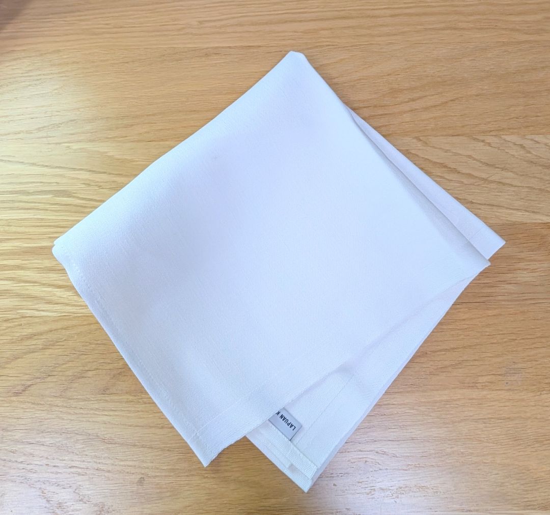 Napkin with two letters